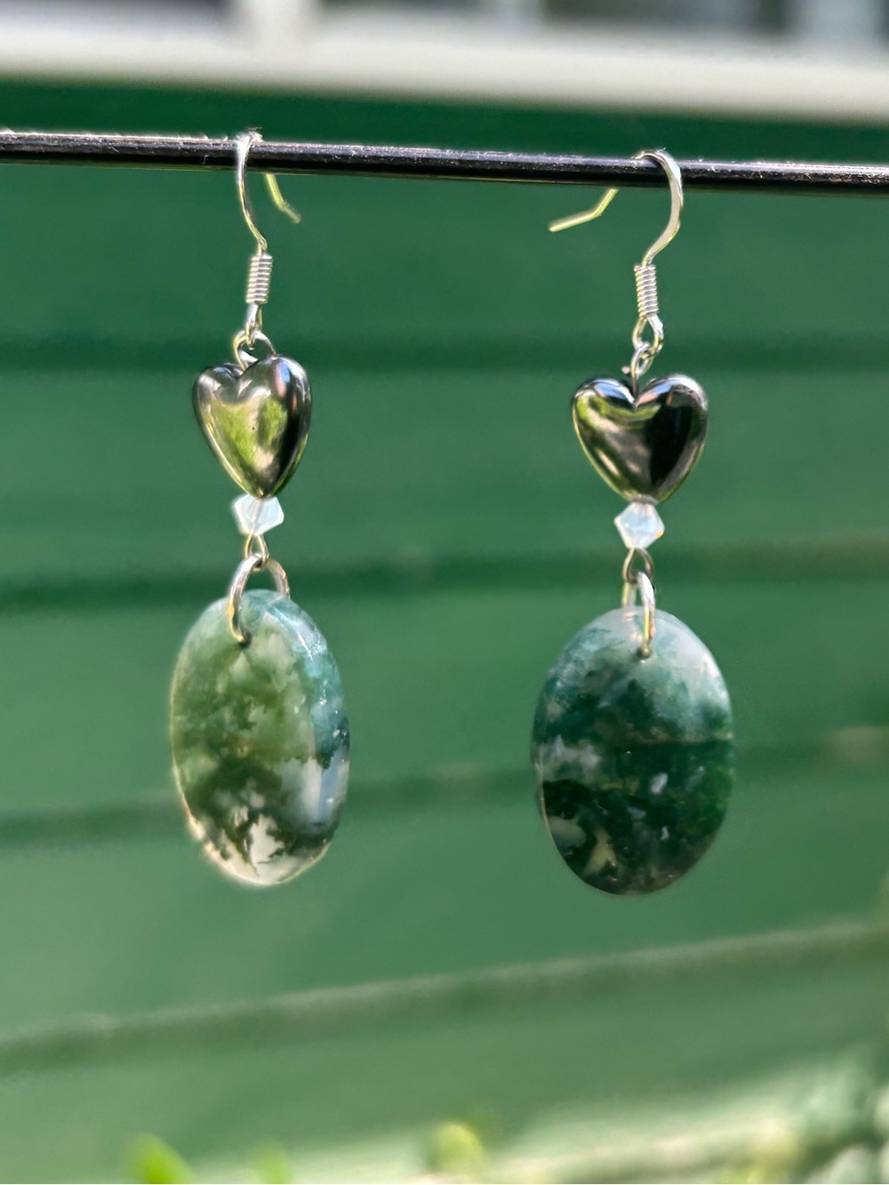 Moss agate dangle earrings.